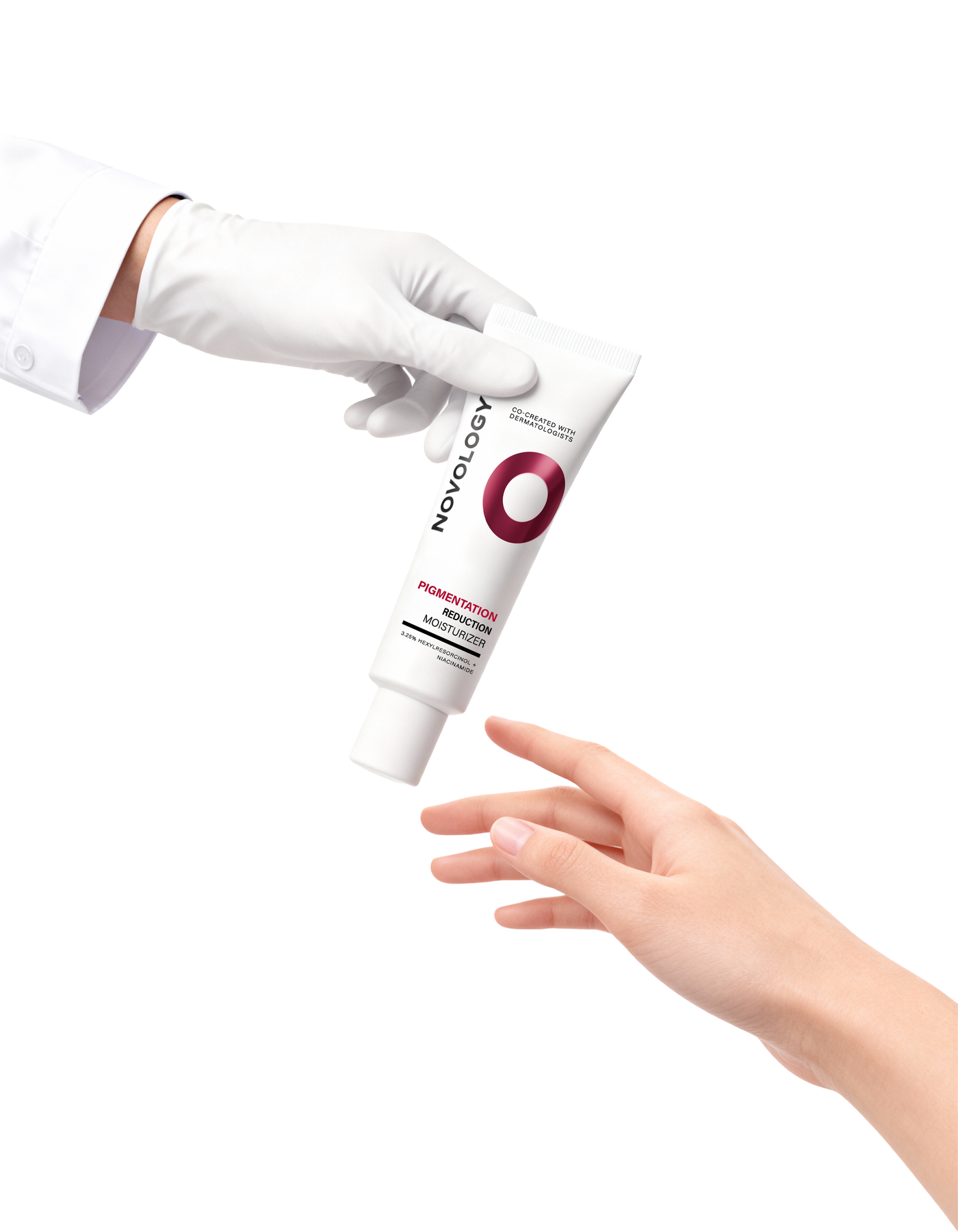 Dermatologist hand passing product to consumer